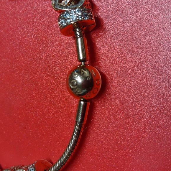 Authentic Pandora Beautiful 14k Rose gold bracelet with customized charms. - Picture 3 of 7